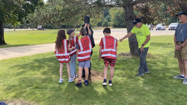 Students at Westwoods Elementary School install their Peace Pole.